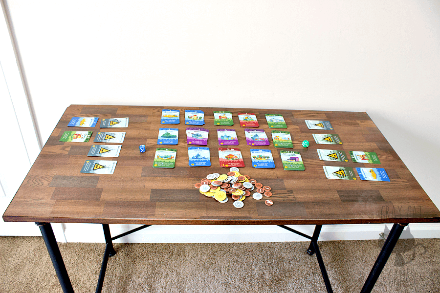 Machi Koro is a cartoon-y, cute, fun game that uses dice rolling and card buying in a race to finish a town. It plays really well for 2-4 players and provides a breezy, interesting experience. It’s hard to go wrong with a Spiel des Jahres nominee!